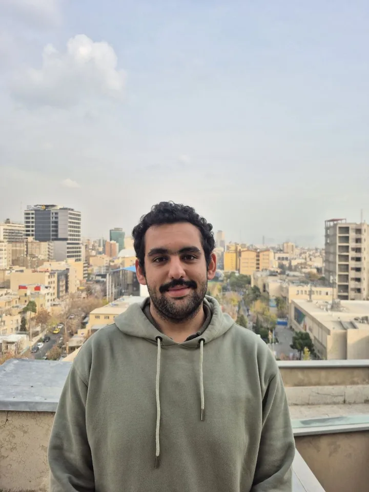Portrait of Mahbod BemaniCham against the Tehran skyline